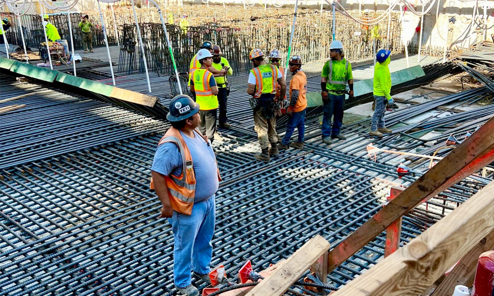 A construction crew installing rebar at a New York construction site